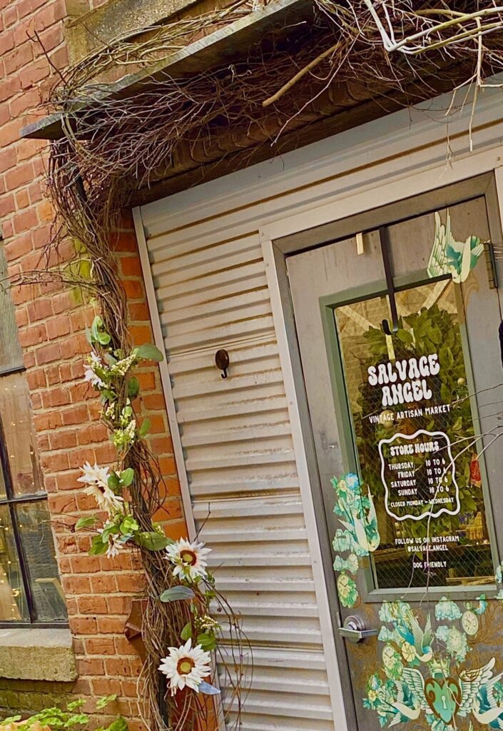 Back-to-school shopping at Salvage Angel vintage market inside NSC with retro fashion, graphic tees, and denim
